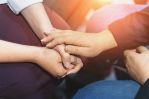 people receive support through addiction treatment programs