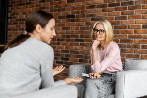 a woman learns coping methods in an alumni program