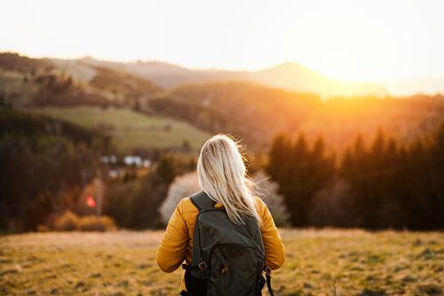 a woman excels in her alumni program
