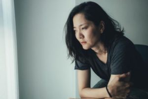 a woman knows she needs an opiate addiction treatment center
